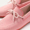 Close up of the vamp and knotted detail on The Boat Shoe in Sunbaked Pink.