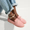 hover | Model wearing The Boat Shoe in Sunbaked Pink. 