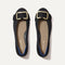 The Emblem Ballet Flat in Black shown from the top. 