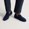 hover | Model wearing The Ravello Penny Loafer in Deep Navy. 