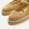 Close up of the vamp of The Espadrille Mary Jane in Metallic Golden Sun. 