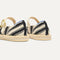 Close up of the heel of The Espadrille Mary Jane in Compass Stripe, with Rothy's signature blue halo. 