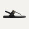 The T-Strap Sandal in Black, shown from the side. 