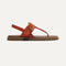 The T-Strap Sandal in Brick, shown from the side. 