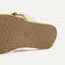 Close up of the outsole of The T-Strap Sandal in Cream Puff.