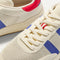 Close up of the toe and stitching details of The Men's Court Sneaker in Turbo Blue. 