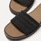 Close up of the top strap of The Slide Sandal in Black Crochet. 