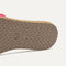 Close up of the outsole of The Slide Sandal in Rouge Crochet.