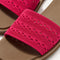 Close up of the top strap of The Slide Sandal in Rouge Crochet. 