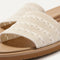 Close up of the top strap of The Slide Sandal in Sandy Crochet. 