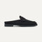 The Penny Loafer Mule in Black shown from the side.