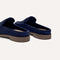 Close up of the heel of The Penny Loafer Mule in ReVelvet Navy, with Rothy's signature blue halo.