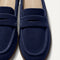 Close up of the toe and vamp of The Penny Loafer Mule in ReVelvet Navy, showing the penny keeper detail.