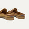 Close up of the heel of The Penny Loafer Mule in Wheat Raffia-Knit, with Rothy's signature blue halo.