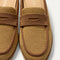 Close up of the toe and vamp of The Penny Loafer Mule in Wheat Raffia-Knit, showing the penny keeper detail.