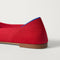 Close up of the heel of The Point III in Cherry, with Rothy's signature blue halo. 
