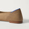 Close up of the heel of The Point III in Maple, with Rothy's signature blue halo. 