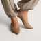 hover | Model wearing The Point III in Maple. 