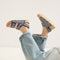 hover | Model wearing The Kids Double Strap Sandal in Sailor Stripes.