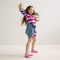 hover | Model wearing The Kids Double Strap Sandal in Tutu.