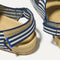 Close up of the velcro heel strap on The Kids Double Strap Sandal in Sailor Stripes.