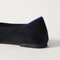 Close up of the heel of The Point III in ReVelvet Black, with Rothy's signature blue halo. 