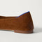 Close up of the heel of The Point III in ReVelvet Russet, with Rothy's signature blue halo. 