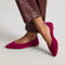 hover | Model wearing The Point III in ReVelvet Mulberry Python. 