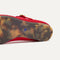 The sole of The T-Strap Mary Jane in Red Crisp.
