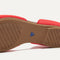 The outsole of The D'Orsay Point in Red Hot
