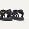 Close up of the back heel strap of The Fisherman Sandal in Black.
