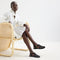 Alternate view of a model wearing The Fisherman Sandal in Black.