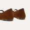 Close up of the heel of The Max Square Mary Jane in ReVelvet Russet, with Rothy's signature blue halo.