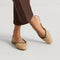 hover | Model wearing The Almond Slingback in Eyelet Frappe.