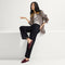 Alternate view of a model wearing The Double Bit Loafer Mule in ReVelvet™ Syrah. 