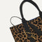Close up of the handles and key leash detail of The ReVelvet™ Lightweight Tote in ReVelvet™ Cat.