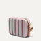 The Crossbody Camera Bag in  Watermelon Market Stripe, shown from the side. 