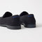 Close up of the heel of The Penny Loafer in ReVelvet Black. 