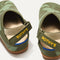 Close up of the back heel strap of The Kids Clog in Green Camo. 