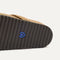 Close up of the outsoles of The Braid Clog in Butternut.