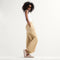 Alternate view of a model wearing The Braid Clog in Dove. 