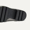 Close up of the outsoles of The Puddle Skipper Boot in Black.