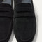 Close up of the vamp and penny keeper detail on The Ravello Penny Loafer in ReVelvet™ Black.