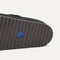Close up of the outsoles of The Men's Cozy Clog in Black.