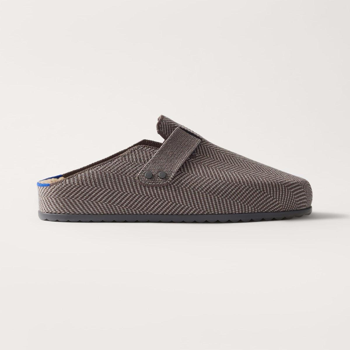 side | The Teddy Men's Clog in Ash Herringbone shown from the side. 