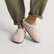 hover | Model wearing The Après Clog in ReVelvet Dove.