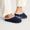 hover | Model wearing The Après Clog in ReVelvet Navy.