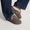 hover | Model wearing The Teddy Buckle Clog in Porcini.