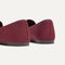 Close up of the heel of The Double Bit Loafer in Deep Maroon, with Rothy's signature blue halo. 