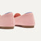 Close up of the heel of The Double Bit Loafer in Peach Pink, with Rothy's signature blue halo. 